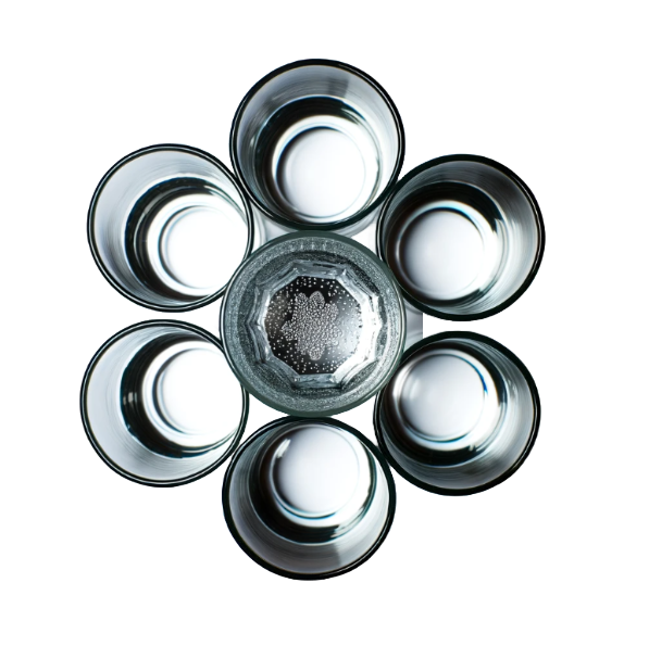 Six glasses in a circle with a glass in the middle